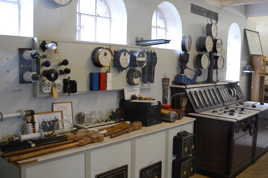 A room in the power plant is being used as a warehouse for historic material from a bygone era